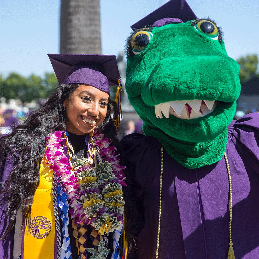 SF State graduate with the Gator mascot